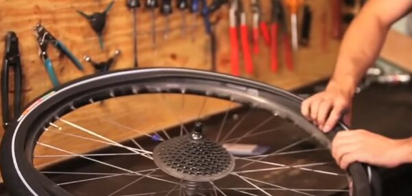 putting wider tires on a road bike